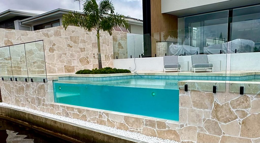 Concrete Pool build with window feature pelican waters